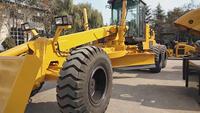 Niveleuse d'occasion 165 CV 6x4 à châssis articulé pour le nivellement routier, équipement de terrassement et de construction - Vente chaude