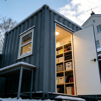 Maison conteneur modulaire 20 pieds à faible coût, pliable, préfabriquée, bureau, garage, magasin en acier et panneaux sandwich