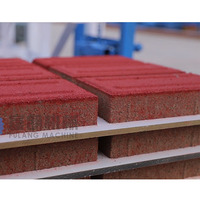 Machines à blocs d'occasion de Chine : Machine entièrement automatique pour la fabrication de briques de ciment et de blocs de béton pour blocs emboîtables