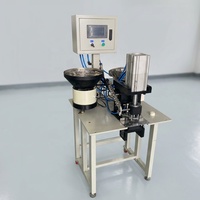 Machine entièrement automatique pour l'installation de œillets sur bâches et auvents
