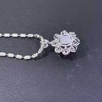 Pendentif floral en or 18 carats avec rubis naturel non chauffé du Mozambique de 1,02 ct, 101 diamants et 9 saphirs blancs pour femme