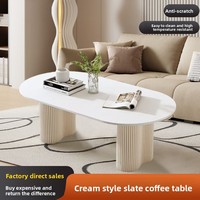 Table basse ovale de salon, couleur crème, haut de gamme, fabriquée au Guangdong, pour petit appartement, style français, nouveau style, usage domestique, blanche