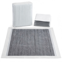 Vente en gros usine de tapis d'apprentissage jetables pour chiens en charbon de bambou et PE, anti-odeur, écologiques, imperméables et anti-fuites, pour l'entraînement des chiots