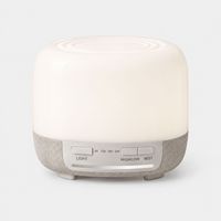 Diffuseur d'aromathérapie en céramique Faner personnalisé à dessus rond, éclairage sept couleurs, finition douce au toucher, fonction de minuterie, fonctionnement silencieux