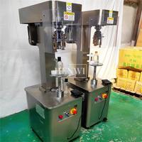 Machine à sertir les boîtes de conserve Henwi, pour sceller les boîtes rondes en fer blanc, pour la production de lait en poudre, de peinture et de conserves alimentaires