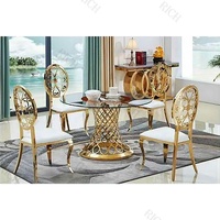 Ensemble de table de salle à manger de luxe nordique moderne 4 chaises pieds de table à manger ronds en verre ensemble de table à manger rond en acier inoxydable doré