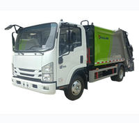 Camion à ordures Isuzu 4x2 manuel personnalisé pour l'exportation, 7 m³ de capacité, compacteur de déchets à chargement arrière de haute qualité, haute efficacité