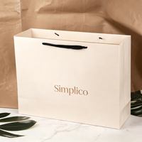 Vente directe d'usine, sac en papier blanc épais et durable, impression personnalisée pour les magasins de vêtements et de chaussures, sac en papier de luxe pour les bijoux