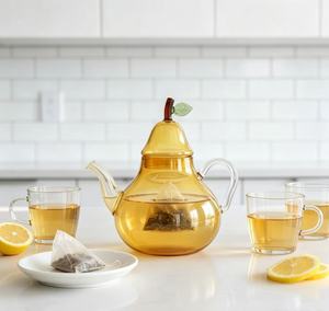 Carafe en verre jaune personnalisée OEM ODM, vente en gros, pichet en verre soufflé à <span class=keywords><strong>la</strong></span> main transparent en forme de fruit pour <span class=keywords><strong>la</strong></span> décoration de <span class=keywords><strong>la</strong></span> maison et du thé - Product Image 1