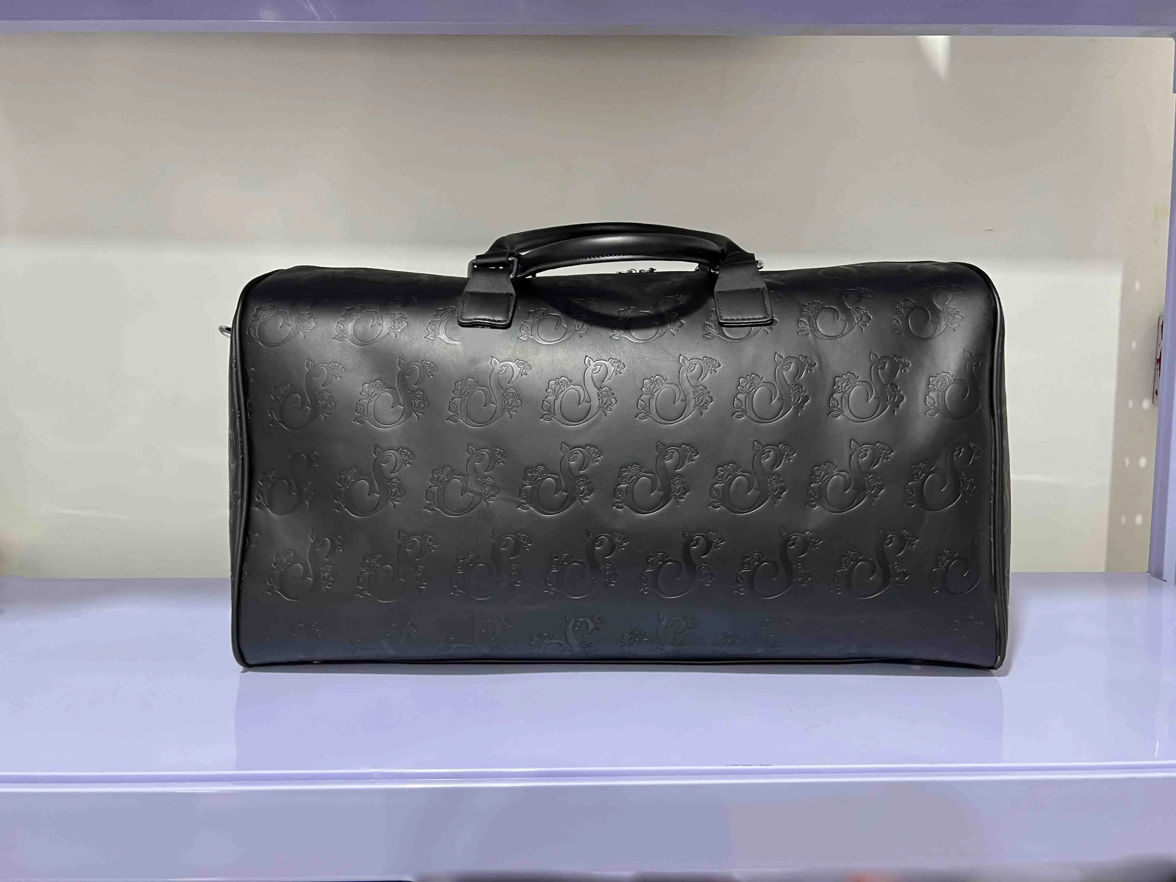 Manufacturer custom logo graphic PU leather large men's duffle bag with weekend bag pressed indentation design travel bag