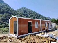 Maison-conteneur de vie modulaire durable de 20 pieds, pliable avec toit plat en pente et planche d'activités étanche