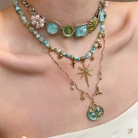 Collar de capas estilo sirena en oferta, con dijes vintage de conchas marinas y estrellas esmaltadas, joyería bohemia costera impermeable para mujer