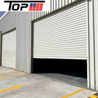 Porte à enroulement isolée en aluminium avec rupture de pont thermique pour économie d'énergie, idéale pour garage et atelier