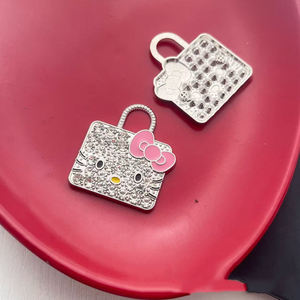 Luxuriöse Handyhüllen-Anhänger zum Basteln: Designer-Metalldekoration mit Katzenmotiv, Schleife und funkelnden Diamanten - Product Image 4