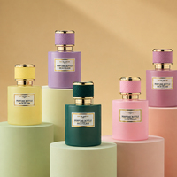 Flacon de parfum vide cylindrique artistique et coloré de 50 ml, personnalisé, luxueux, unique, avec couvercle doré, en verre, avec boîte cadeau