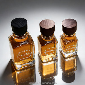 Botella de Perfume Cuadrada Vacía Personalizada OEM de Lujo, 30ml 50ml 100ml, Botella de Perfume de Vidrio Transparente de Calidad con Tapa de Madera - Product Image 1