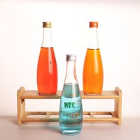 Botella de Vidrio Transparente para Agua Mineral y Gaseosa, 1000ml, 750ml, 500ml, 330ml, Forma Redonda, con Tapa de Aluminio y Logotipo Personalizado, Venta al Por Mayor