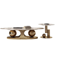 Ensemble de table basse italienne moderne, base sphérique, table d'appoint ovale pour salons, décoration de luxe pour l'intérieur des maisons haut de gamme.