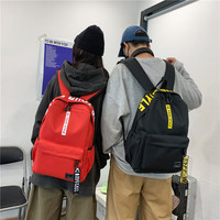 Sac à dos décontracté imperméable en tissu Oxford pour femmes et hommes, simple, couleur unie, avec sangle à lettres, léger, pour voyage, école, sac à dos de couple