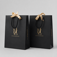 Sac en papier cadeau mat en carton, avec poignée torsadée, doré à chaud, de luxe, pour emballage cosmétique et soins de la peau, vente en gros