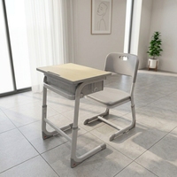 Ensemble chaise et bureau d'école avec pieds en caoutchouc antidérapants intégrés et tiroir à livres intégré pour l'étude à domicile et en classe