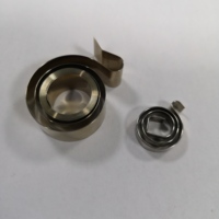 Ressort hélicoïdal à bobine plate rétractable en acier inoxydable Utilisation industrielle Force constante Ressort matériel OEM C72 de haute qualité
