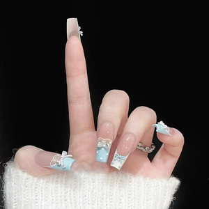 <span class=keywords><strong>Uñas</strong></span> postizas artesanales medianas con diseño de ataúd, en tono nude, con encaje francés, lazo 3D azul bebé y lunares, estilo lindo y kawaii, para uso diario y fiestas. - Product Image 3