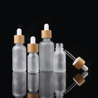 Emballage pour soins de la peau, flacon en verre givré opaque avec compte-gouttes en bambou et bouchon en bois pour huile essentielle et crème pour le visage