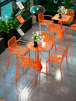 Ensemble de chaises de table à manger orange pour patio extérieur Art en fer Conception de célébrités sur Internet pour cafés Boutiques de thé au lait Balcons Loisirs