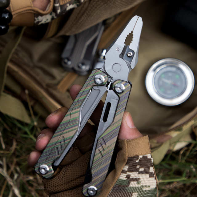 All-in-one Ergonomic Titanium Handle Pocket Folding Pliers Wrench Screwdriver OEM Industrial Grade 20-in-1 Outdoor Use Corporate