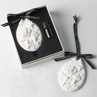 Diffuseur d'huiles essentielles en céramique en forme de fleur de camélia, parfumé, pour voiture, armoire, parfum d'ambiance, boîte cadeau FinRu