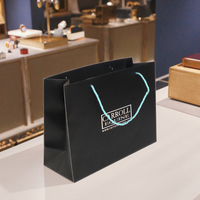 Sac shopping en papier de luxe personnalisé avec gaufrage/estampage à chaud, logo personnalisé, poignée en ruban pour l'emballage de chaussures et de vêtements, utilisation promotionnelle