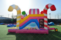 Château gonflable commercial haut de gamme en PVC robuste avec toboggan combiné, trampoline à bungee et structure gonflable de type « Candy Park »