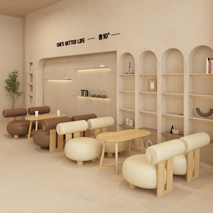 Scandinavian Style Beige Leather Accent Chair and Round Wooden Coffee <b>Table</b> Set for Minimalist Cafe Lounge Area - Product Image 6