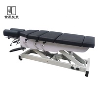 Table de chiropratique électrique à plateau inclinable, modèle best-seller, avec design traditionnel pour hôtels et salles de sport, construction métallique