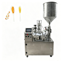 Machine de remplissage rotative automatique 2026 pour miel, yaourt et café, et machine de scellage pour l'emballage de liquides alimentaires