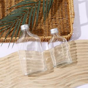 Bouteille vide transparente haut de gamme, plate et ronde, 50 ml/100 ml/250 ml, adaptée au brandy, au gin, au rhum, à la vodka, à la <span class=keywords><strong>tequila</strong></span>, avec bouchon en aluminium - Product Image 4