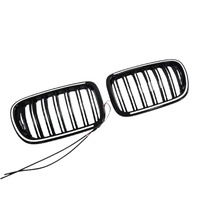 Compatible avec les modèles BMW X3 F25 Dual-line 2011-2013. C'est une grille noire éclairée par LED, fabriquée en matériau PC.