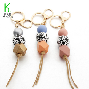 Llavero con Borla de Cuentas de Madera con Estampado de Leopardo, Tendencia Actual, Llavero de Cuentas de Madera y Silicona - Product Image 1