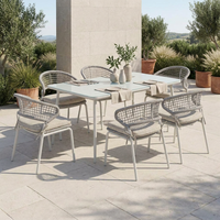 Chaise de salle à manger d'extérieur moderne en corde avec structure en acier thermolaqué, dossier en corde tressée et coussin pour patio, jardin, café, école et villa