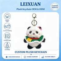 Porte-clés en peluche panda mignon au crochet, col rouge et vert, bord à volants blancs, décoration florale, pour sac à dos, sac à main, cadeau