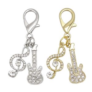 Porte-clés en métal incrusté de diamants en forme de note de musique, cadeau idéal pour les concerts de musique, vente chaude - Product Image 1