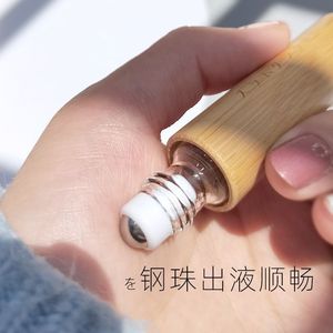 ขวดแก้วทรงกลมหุ้มไม้ไผ่ ขนาด 5 มล. 10 มล. สำหรับบรรจุน้ำมันหอมระเหย พร้อมฝาไม้ ดีไซน์หน้าต่างใส เหมาะสำหรับทุกสภาพผิว - Product Image 5