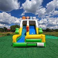 Structure gonflable commerciale avec toboggan pour événements de location, carnavals et festivals communautaires
