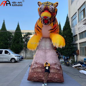Mascotte animale réaliste géante personnalisée, tigre gonflable sur base rocheuse, modè<span class=keywords><strong>le</strong></span> pour événements en plein air, exposition en parc et décoration publicitaire - Product Image 1