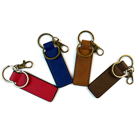 Porte-clés en cuir PU de luxe avec logo personnalisé en relief, en gros, pour cadeaux d'entreprise et souvenirs d'événements professionnels