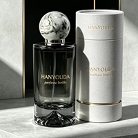 Flacon de parfum en verre gris fumé haut de gamme de 30 ml, 50 ml, 100 ml, avec bouchon sphérique en marbre et gravure de logo personnalisée, vente en gros