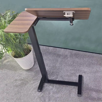 Table de lit réglable en métal avec plateau rabattable et réglage pneumatique de la hauteur pour hôpital, maison, école, salle à manger