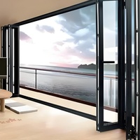 Porte pliante robuste en acier inoxydable pour balcon de villa, cloison en verre coulissante et imbriquée, utilisation hôtelière minimaliste, rail suspendu