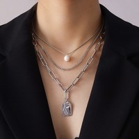 Meilleure vente de bijoux en acier inoxydable or deux couches empilables chaîne cubaine perle collier à breloques